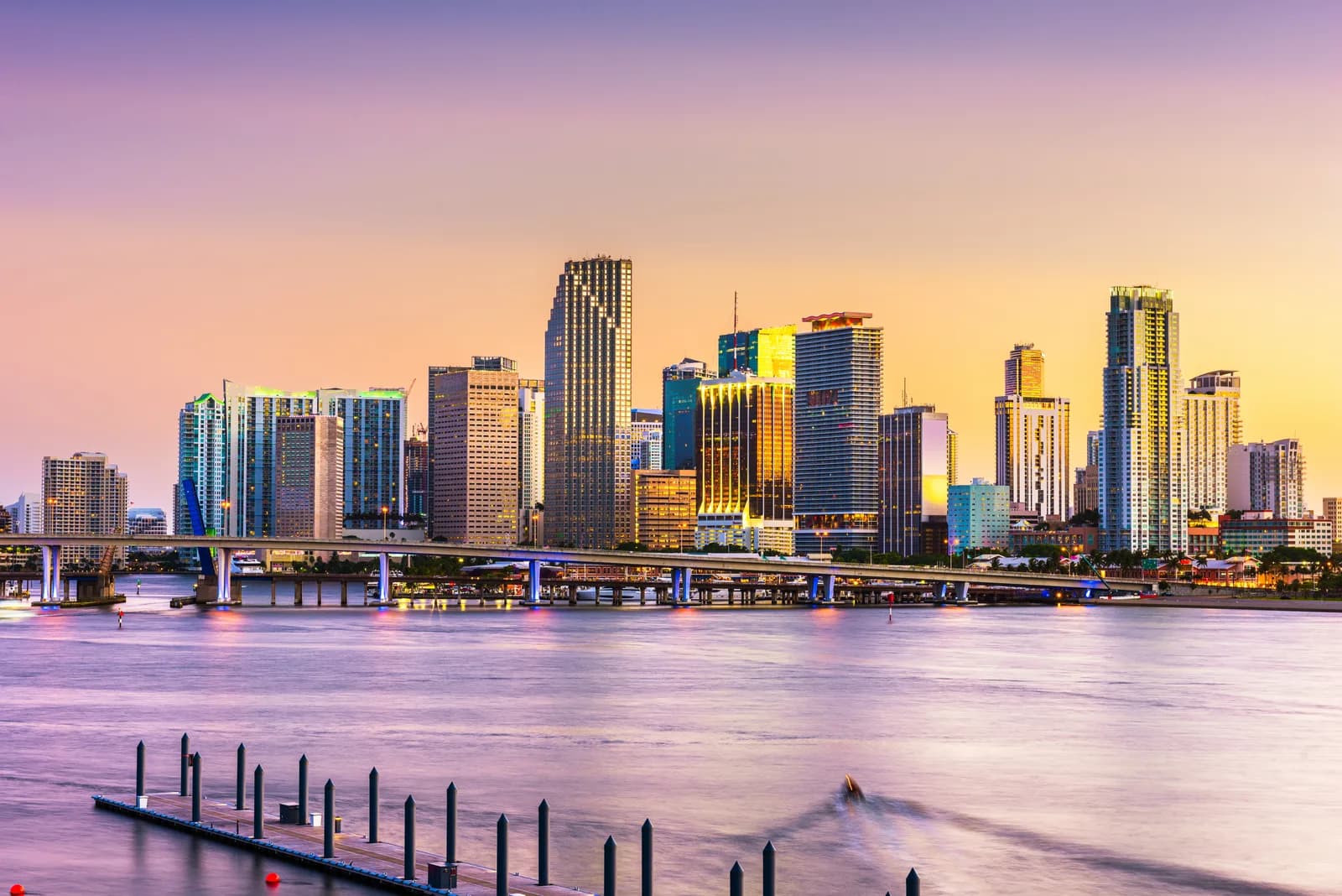 The downtown Miami skyline across the bay at dusk